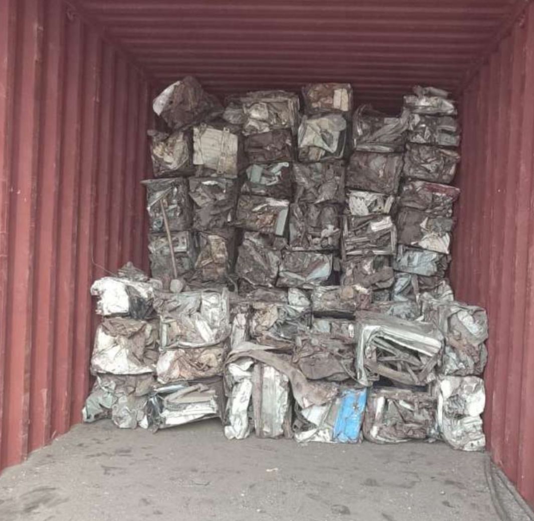 MS Bundles — compressed baled MS scrap in shipping container